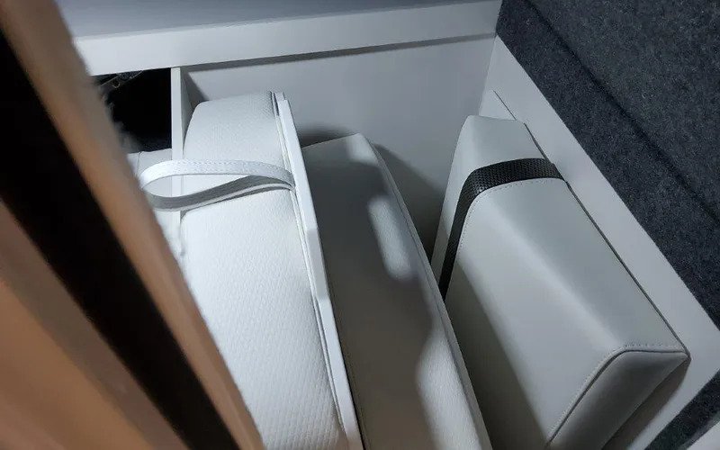 Slide: The Image of Interior seating of 2025 Formula 310 Bowrider I/O, featuring white cushioned seats. - 21