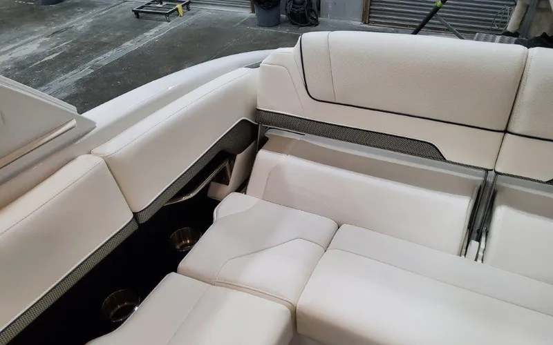 Slide: The Image of 2025 Formula 310 Bowrider I/O interior with luxurious white seating and modern design. - 41