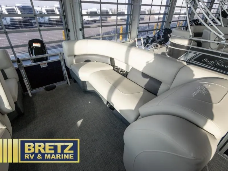 Slide: The Image of Vista Fish 18 boat interior with plush seating, showcased at Bretz RV & Marine. - 10