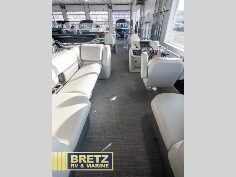 Slide: The Image of Interior of 2025 Vista Fish 18 boat with plush seating at Bretz RV & Marine showroom. - 5