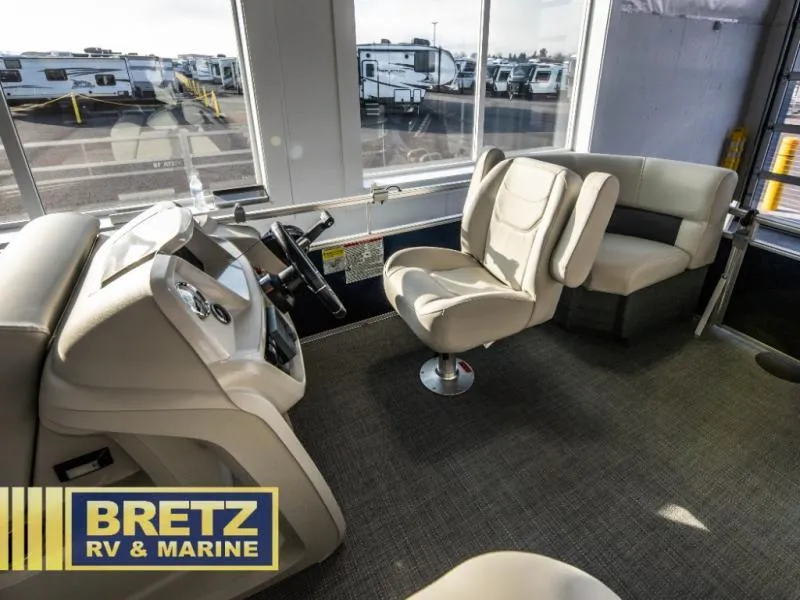 Slide: The Image of Interior of 2025 Vista Fish 18 boat with seating and steering console at Bretz RV & Marine. - 9