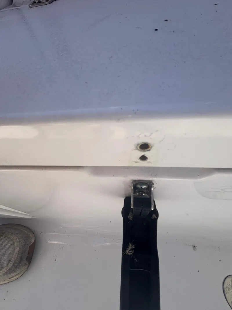 Slide: The Image of 2020 Sportsman Heritage 231 Center Console boat detail with mounting bracket. - 11