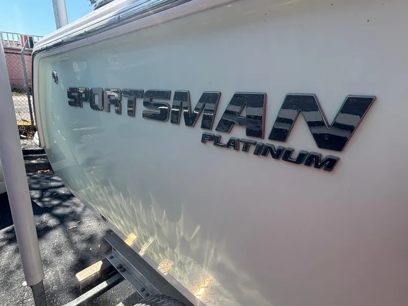 Slide: The Image of 2020 Sportsman Heritage 231 Center Console boat with "Platinum" branding on the side. - 3