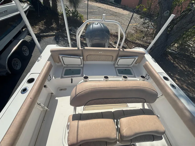 Slide: The Image of 2020 Sportsman Heritage 231 Center Console boat interior with seating and storage compartments. - 9