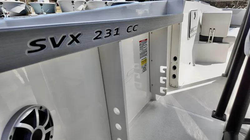 Slide: The Image of 2025 Starcraft SVX 231 OB boat interior, featuring sleek design and modern amenities. - 15