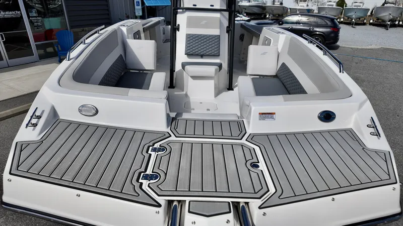 Slide: The Image of 2025 Starcraft SVX 231 OB boat with spacious seating and sleek design. - 6
