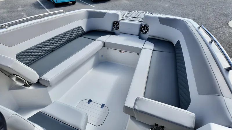 Slide: The Image of Interior of 2025 Starcraft SVX 231 OB boat with spacious seating and modern design. - 9