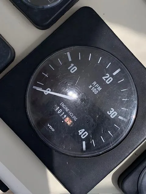 Slide: The Image of Close-up of a Carolina Classic 28 tachometer showing RPM and engine hours. - 11
