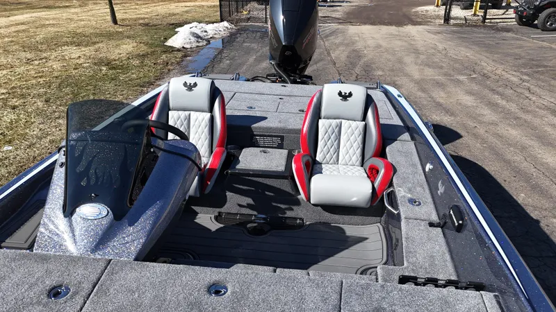 Slide: The Image of 2025 Phoenix 921 ELITE boat interior with dual seats and steering console. - 19