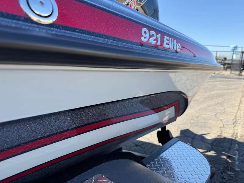 Slide: The Image of Close-up of 2025 Phoenix 921 Elite boat with red and white detailing. - 23