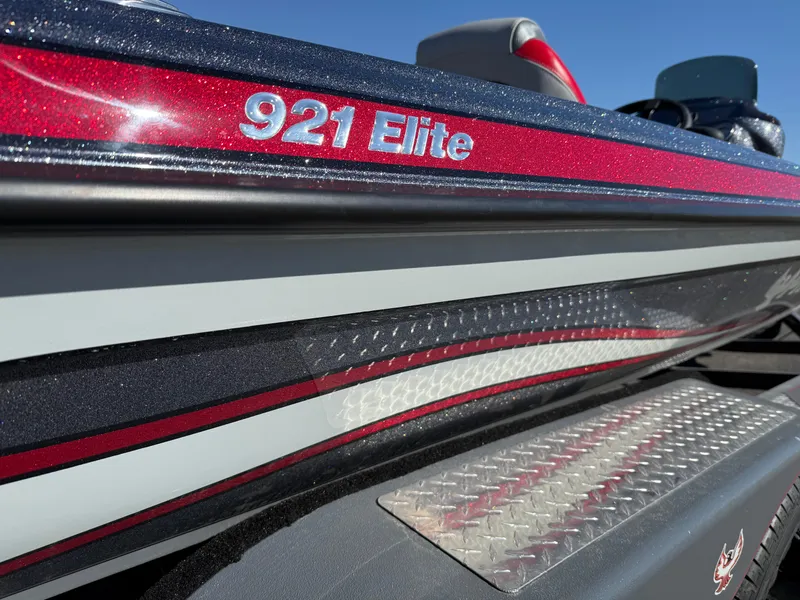 Slide: The Image of 2025 Phoenix 921 Elite boat with sleek design and metallic accents. - 24