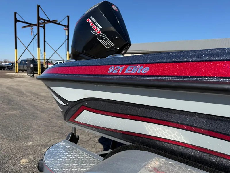 Slide: The Image of 2025 Phoenix 921 ELITE boat with sleek design and powerful engine. - 25