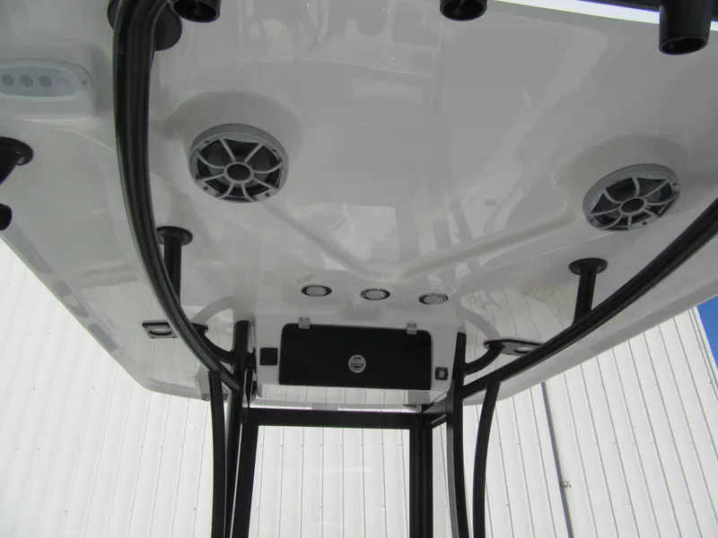 Slide: The Image of Underside view of Parker 2400 Center Console boat's T-top with speakers, 2025 model. - 10