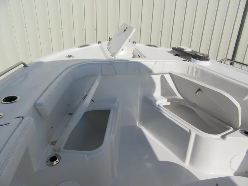 Slide: The Image of 2025 Parker 2400 Center Console boat interior with open storage compartments. - 3