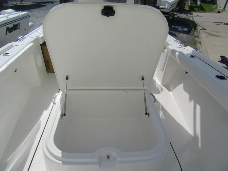 Slide: The Image of Open storage compartment on a 2025 Parker 2400 Center Console boat. - 4