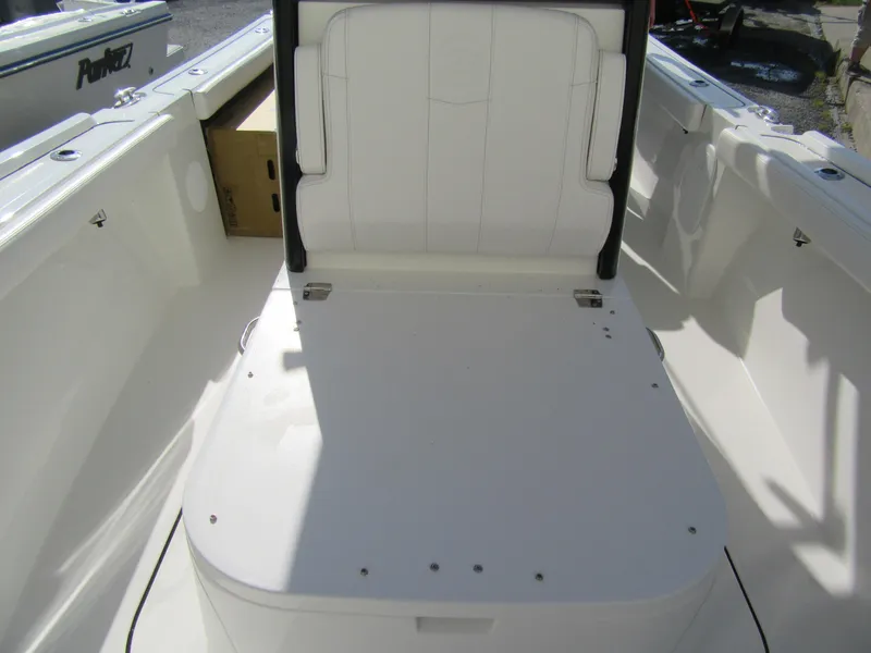 Slide: The Image of 2025 Parker 2400 Center Console boat interior with seating and storage. - 5