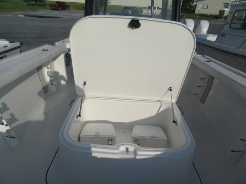 Slide: The Image of 2025 Parker 2900 Center Console boat with open storage compartment. - 16