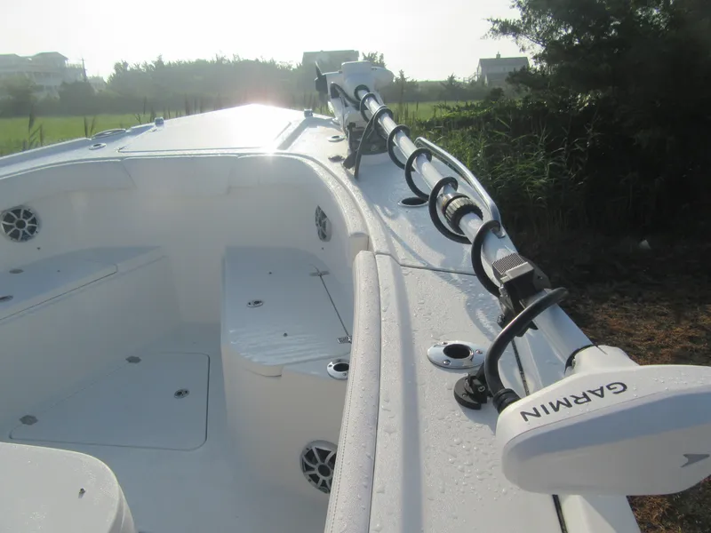 Slide: The Image of 2025 Parker 2900 Center Console boat with Garmin equipment, docked outdoors. - 21