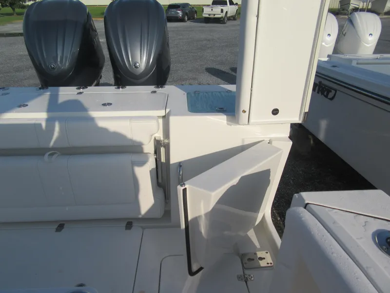 Slide: The Image of 2025 Parker 2900 Center Console boat interior with dual outboard motors. - 23