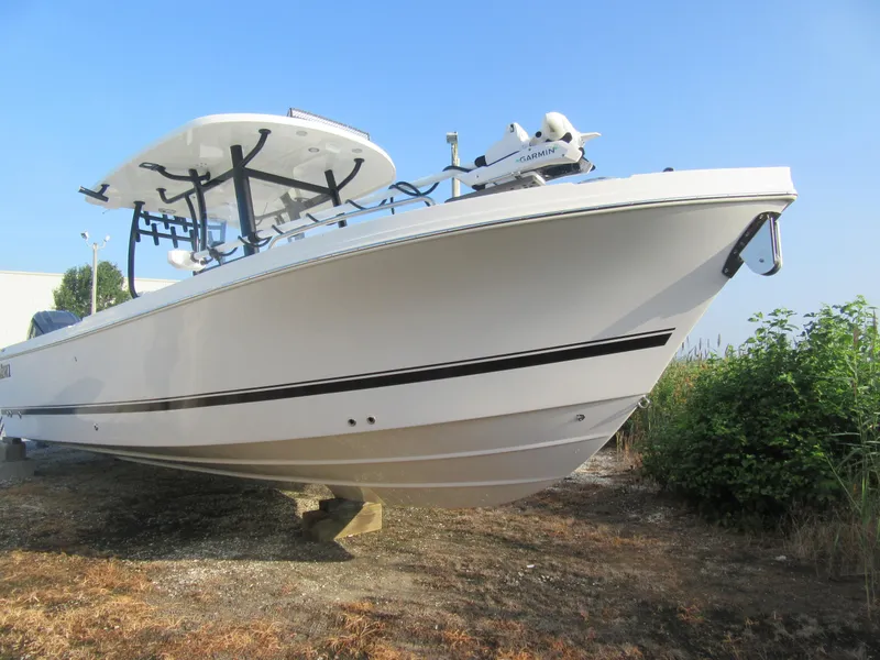 Slide: The Image of 2025 Parker 2900 Center Console boat on land, clear sky background. - 24