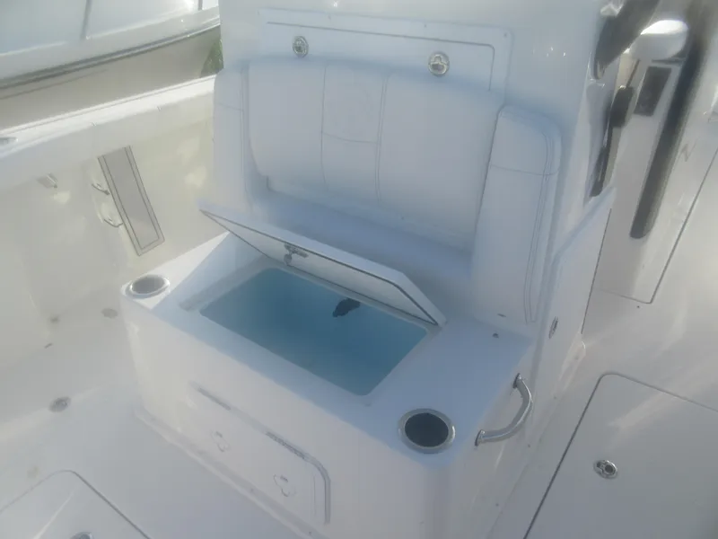 Slide: The Image of 2025 Parker 2900 Center Console boat interior with open storage compartment. - 5