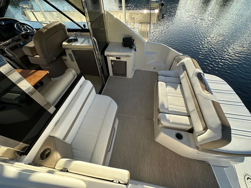 Slide: The Image of 2017 Regal 42 Sport Coupe interior with luxurious seating and modern amenities. - 14