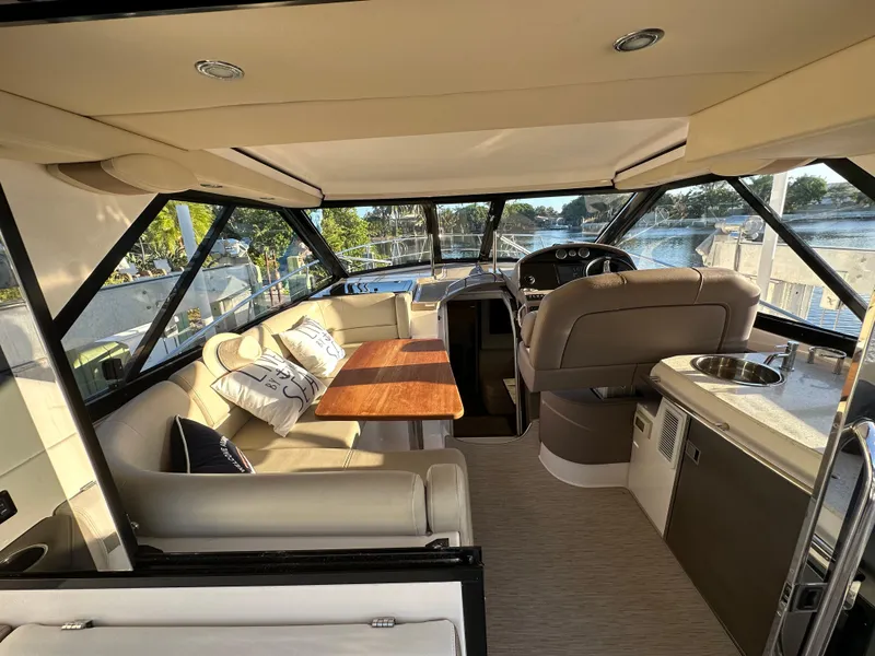 Slide: The Image of Luxurious interior of 2017 Regal 42 Sport Coupe yacht with plush seating and elegant design. - 3