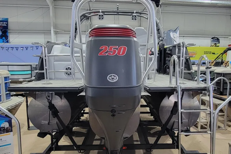 Slide: The Image of 2022 Bentley Pontoons Elite 253 Swingback with 250 HP engine in showroom. - 10