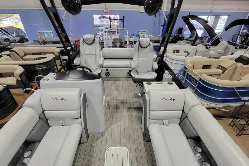 Slide: The Image of 2022 Bentley Pontoons Elite 253 Swingback interior with luxurious seating and modern design. - 3