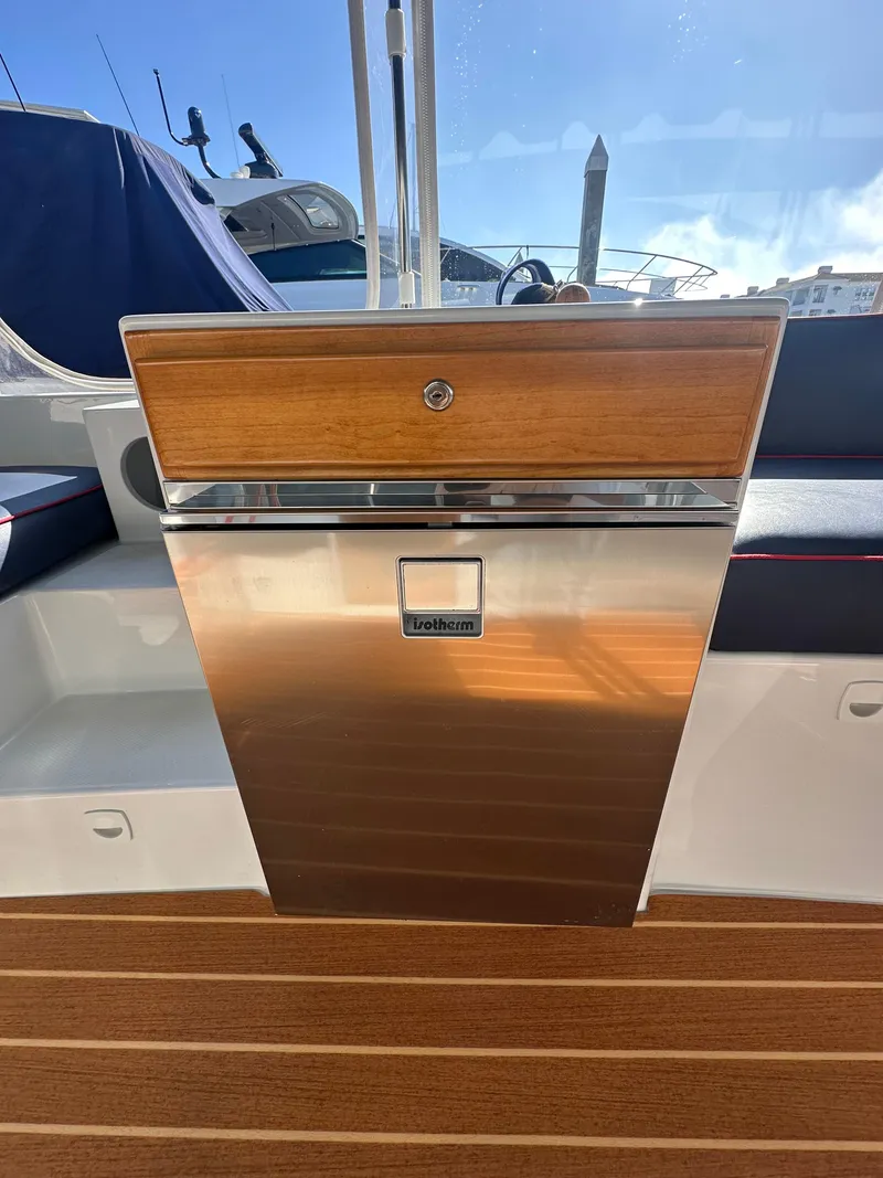 Slide: The Image of Stainless steel cabinet on 2021 Duffy Bay Island boat with wooden accents. - 6