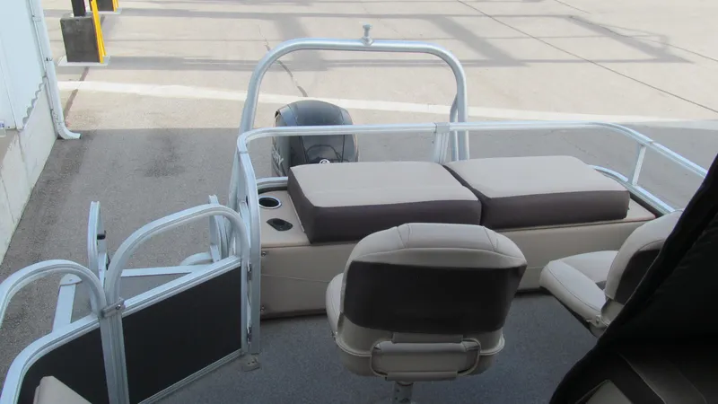 Slide: The Image of 2018 Sun Tracker Fishin' Barge 22 XP3 interior with seating and railing. - 6
