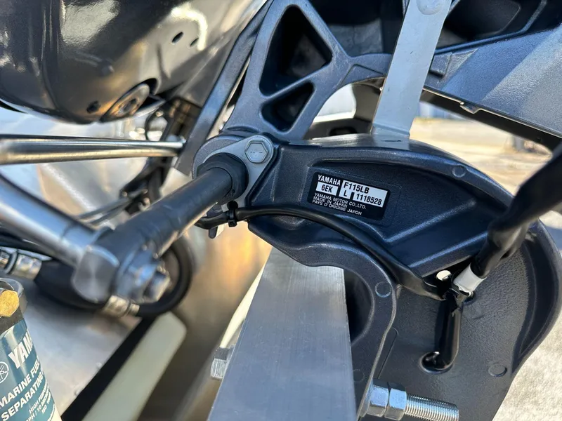 Slide: The Image of Close-up of a Yamaha engine component on a 2023 Godfrey SWEETWATER 2286 SFL boat. - 9