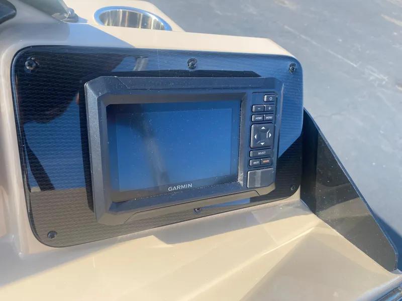 Slide: The Image of Garmin display on 2025 SunCatcher Select 322RC boat dashboard. - 11