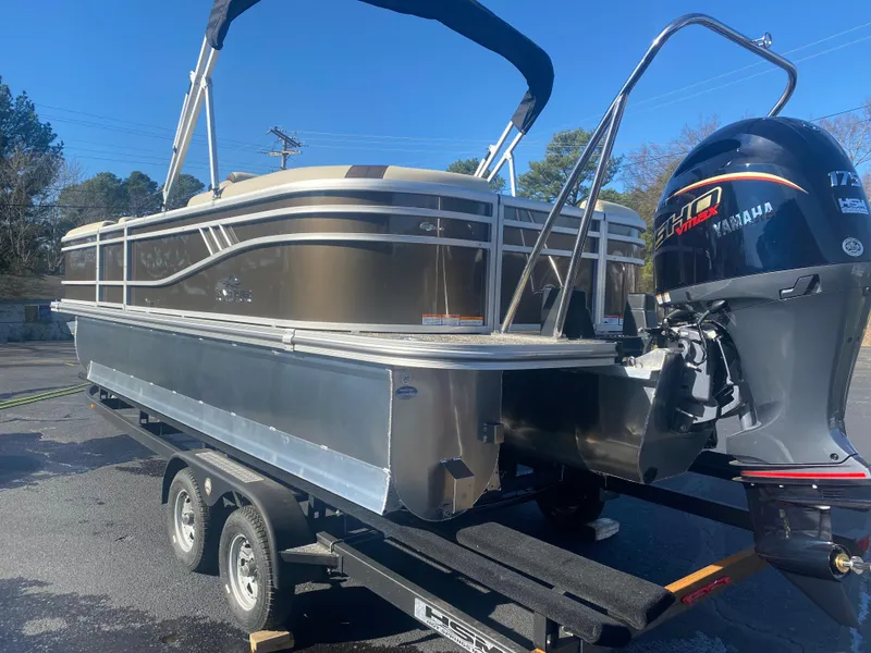 Slide: The Image of 2025 SunCatcher Select 322RC pontoon boat on trailer with Yamaha outboard motor. - 20
