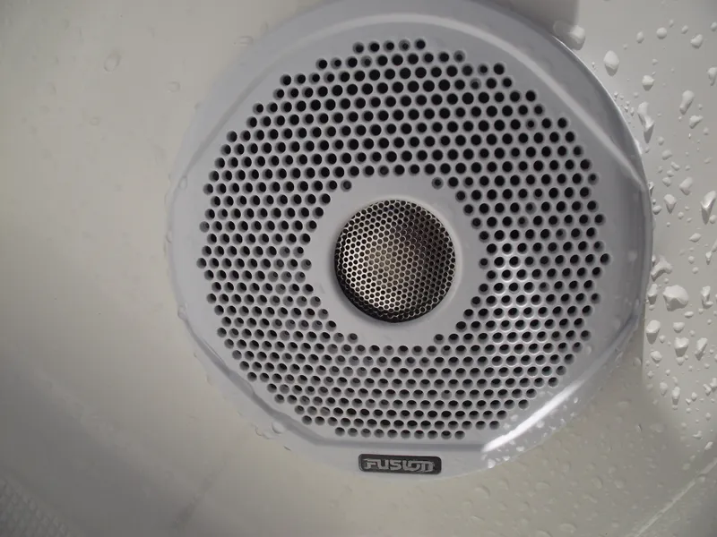 Slide: The Image of Fusion marine speaker on 2012 Sea Hunt Ultra 211 boat, close-up view. - 20