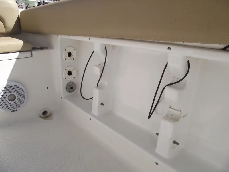 Slide: The Image of Interior view of a 2012 Sea Hunt Ultra 211 boat, showing wiring and speaker details. - 30