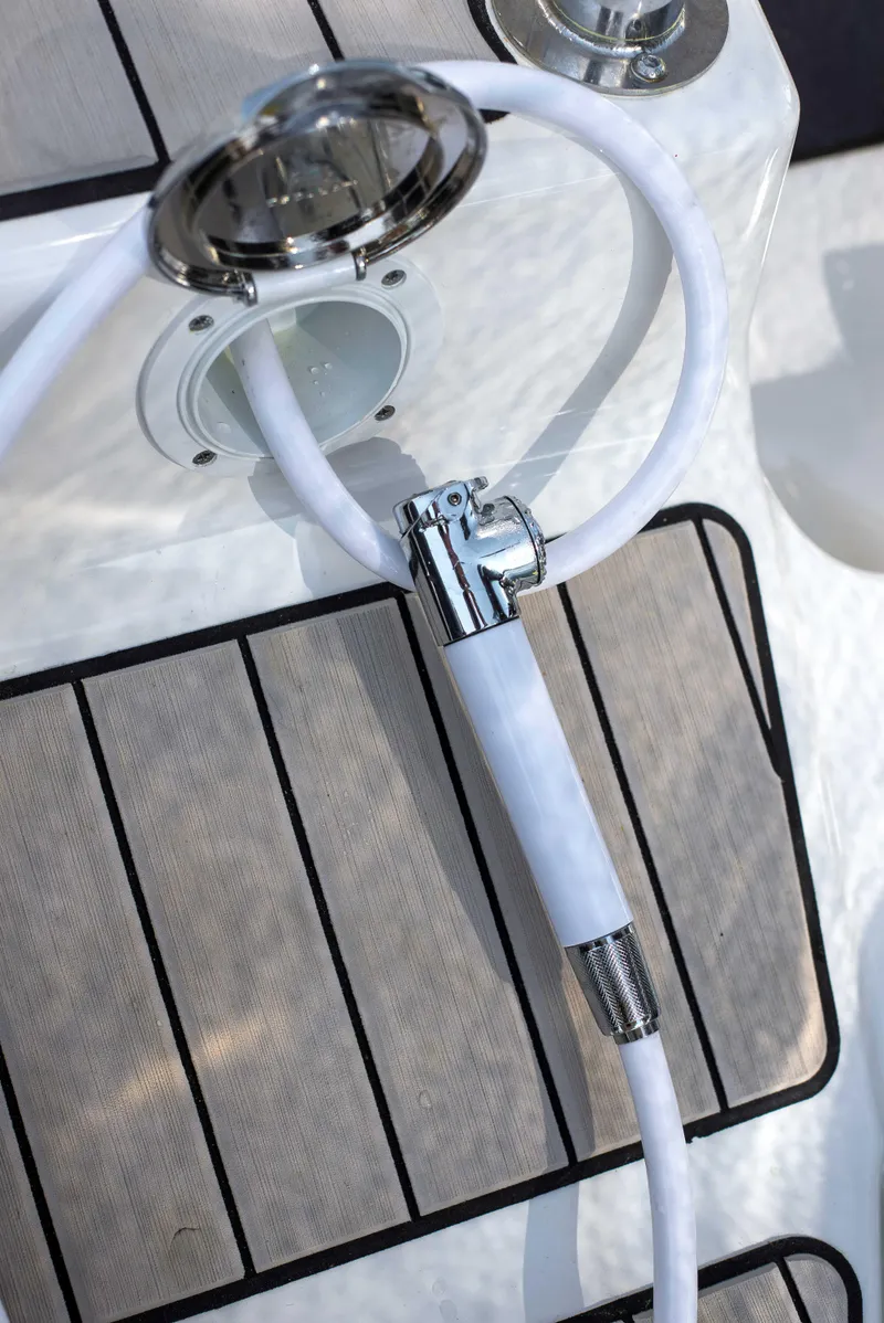 Slide: The Image of 2025 Zodiac Medline 6.8 boat deck with hose and fittings. - 8