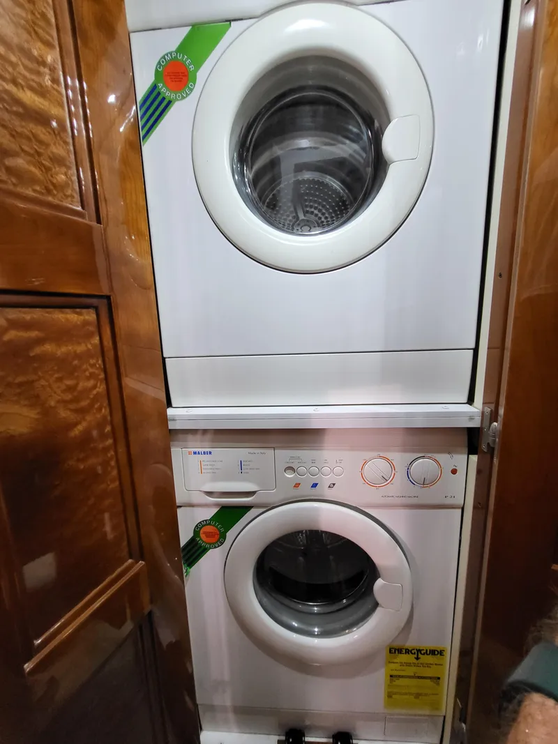 Slide: The Image of Stacked washer and dryer in wooden cabinet, Marquis 59 model, 2004. - 40