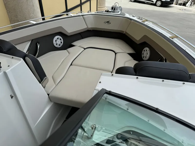 Slide: The Image of 2022 Monterey 278 Super Sport boat interior with beige seating and modern design. - 10