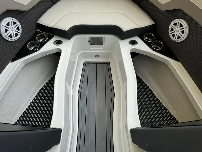 Slide: The Image of 2022 Monterey 278 Super Sport boat interior with cup holders and speakers. - 13