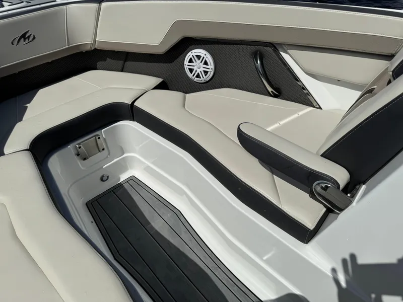 Slide: The Image of 2022 Monterey 278 Super Sport boat interior with sleek seating and modern design. - 14