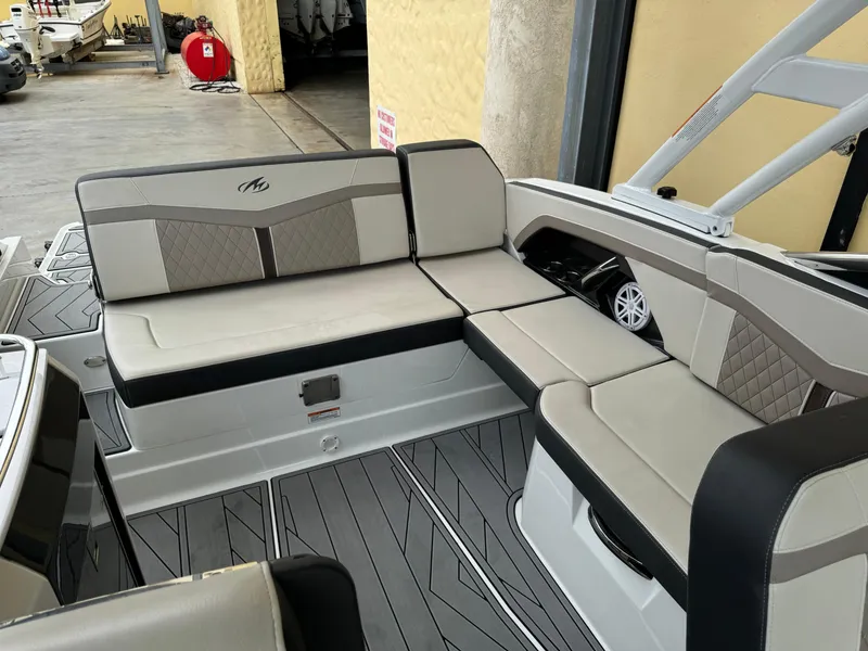 Slide: The Image of 2022 Monterey 278 Super Sport boat interior with stylish seating and modern design. - 28