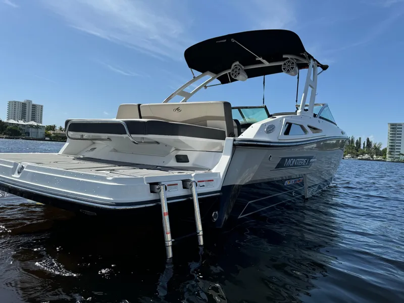 Slide: The Image of 2022 Monterey 278 Super Sport boat on water, featuring sleek design and modern amenities. - 3