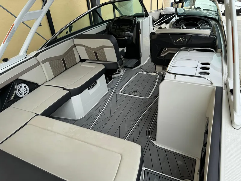 Slide: The Image of 2022 Monterey 278 Super Sport boat interior with sleek seating and modern design. - 35