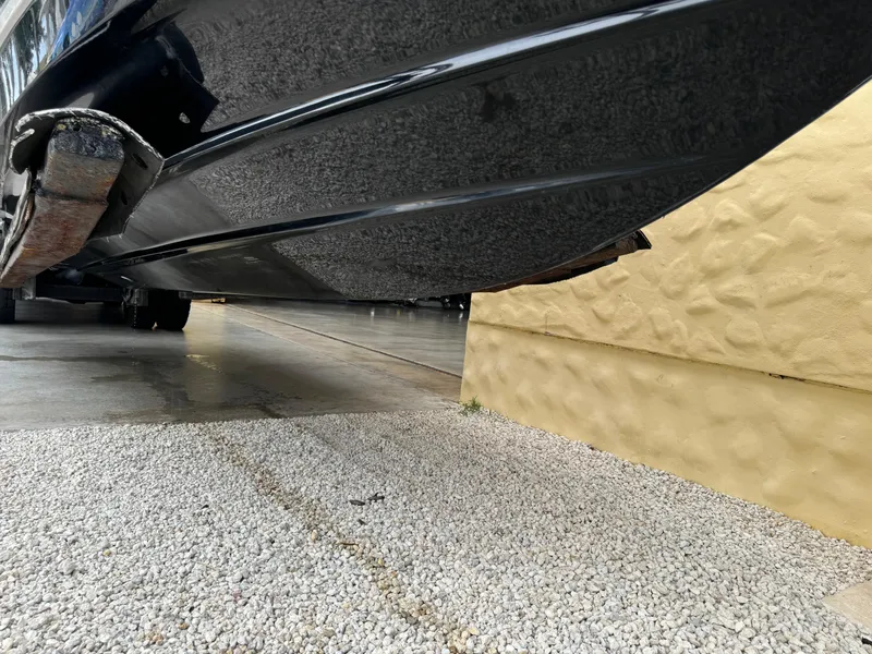 Slide: The Image of 2022 Monterey 278 Super Sport boat hull on trailer, close-up view. - 38