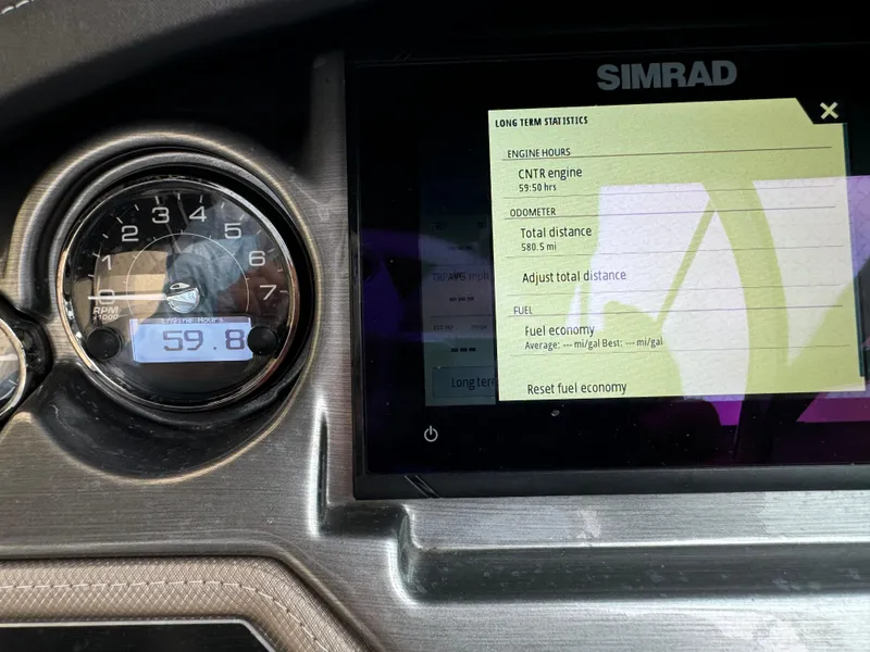 Slide: The Image of Dashboard of 2022 Monterey 278 Super Sport with Simrad display and engine statistics. - 39