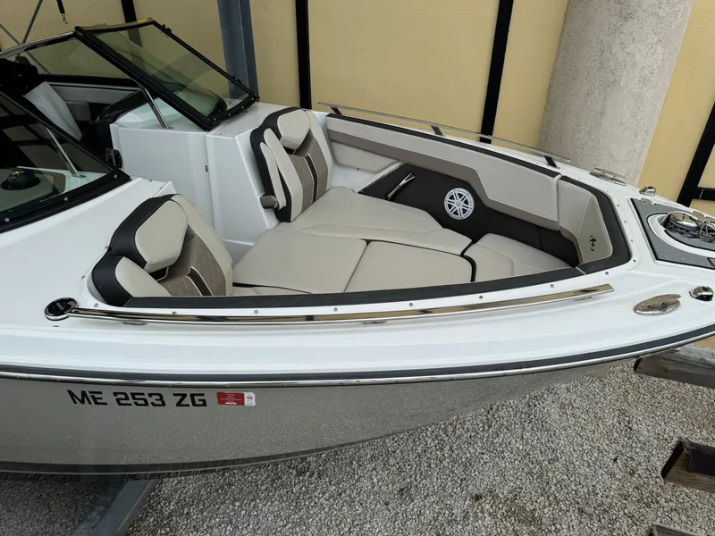 Slide: The Image of 2022 Monterey 278 Super Sport boat with sleek seating and modern design. - 8