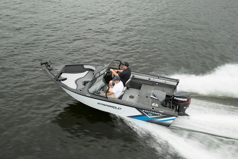 Slide: The Image of 2024 Starweld Victory 18 DC boat speeding on water, featuring sleek design and powerful engine. - 10