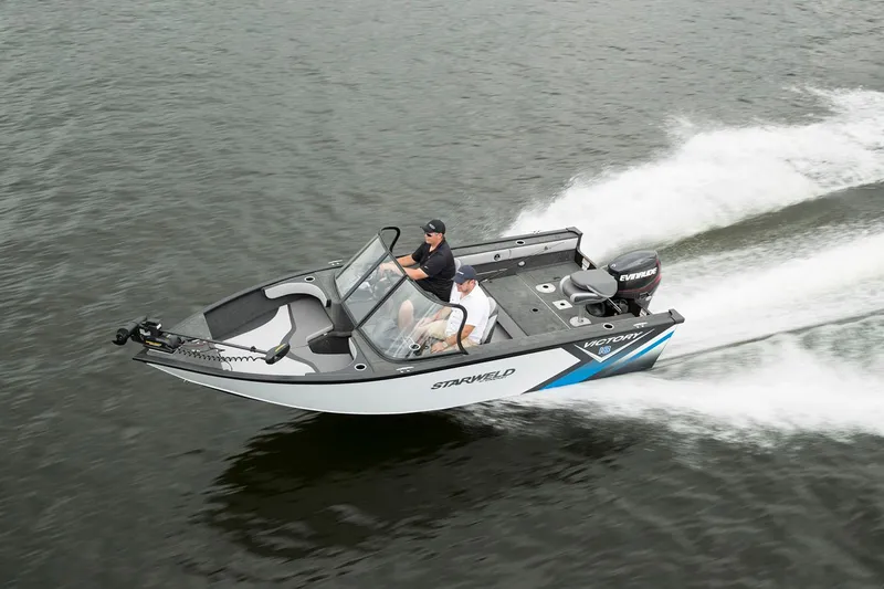 Slide: The Image of 2024 Starweld Victory 18 DC boat cruising on water, showcasing sleek design and performance. - 11