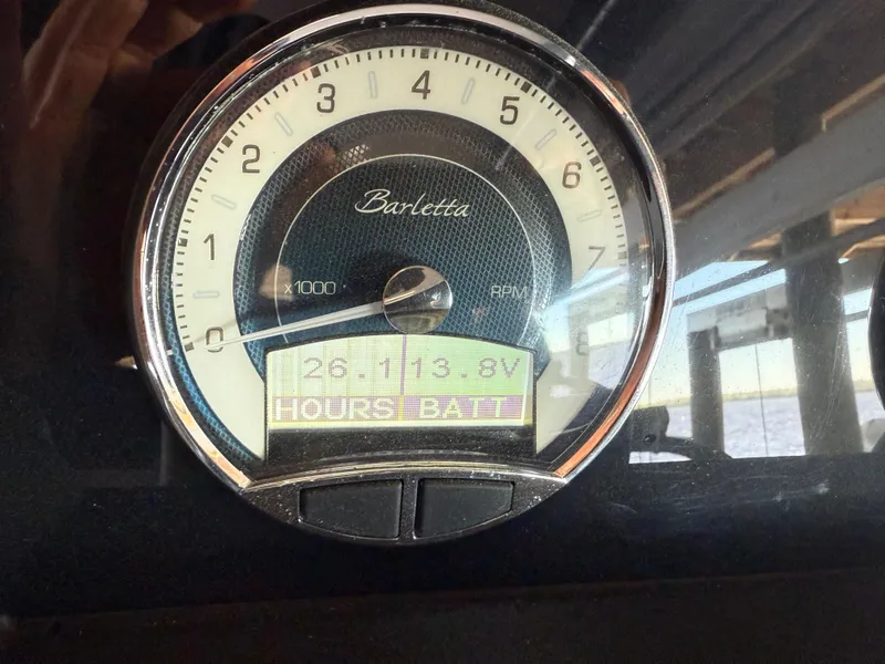 Slide: The Image of Close-up of 2022 Barletta Lusso 23U tachometer displaying RPM and digital readout. - 18